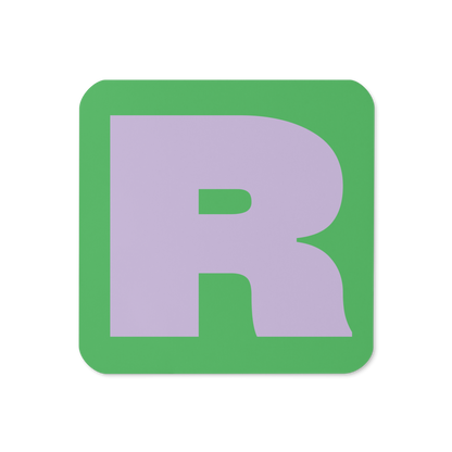Cork-back coaster with a bold lilac purple fat font R letter on a mint green background, graphic modern design.