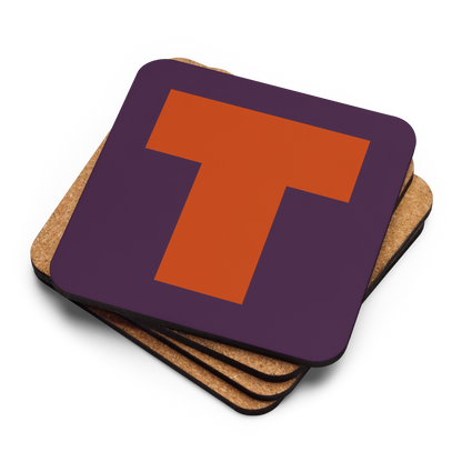 Four coasters stacked on top of each other, the top with a fat font large orange T on a purple background.