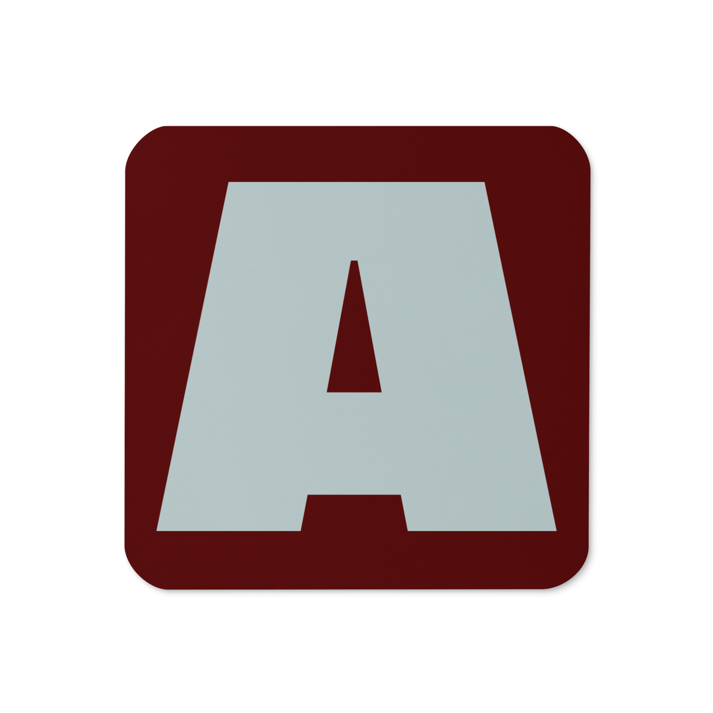 Cork-back coaster with a bold pale gray fat font A letter on a burgundy red background, graphic modern design.