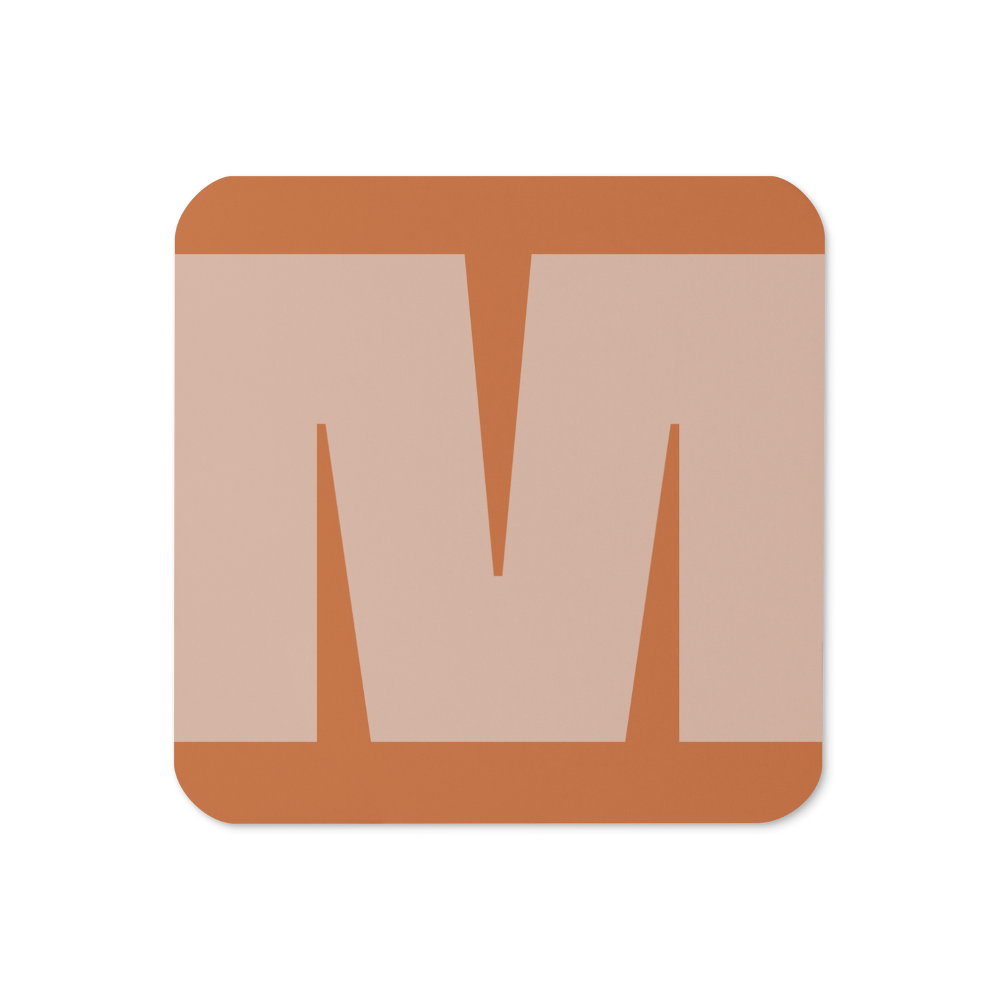 Cork-back coaster with a bold soft peach fat font M letter on an orange background, graphic modern design.