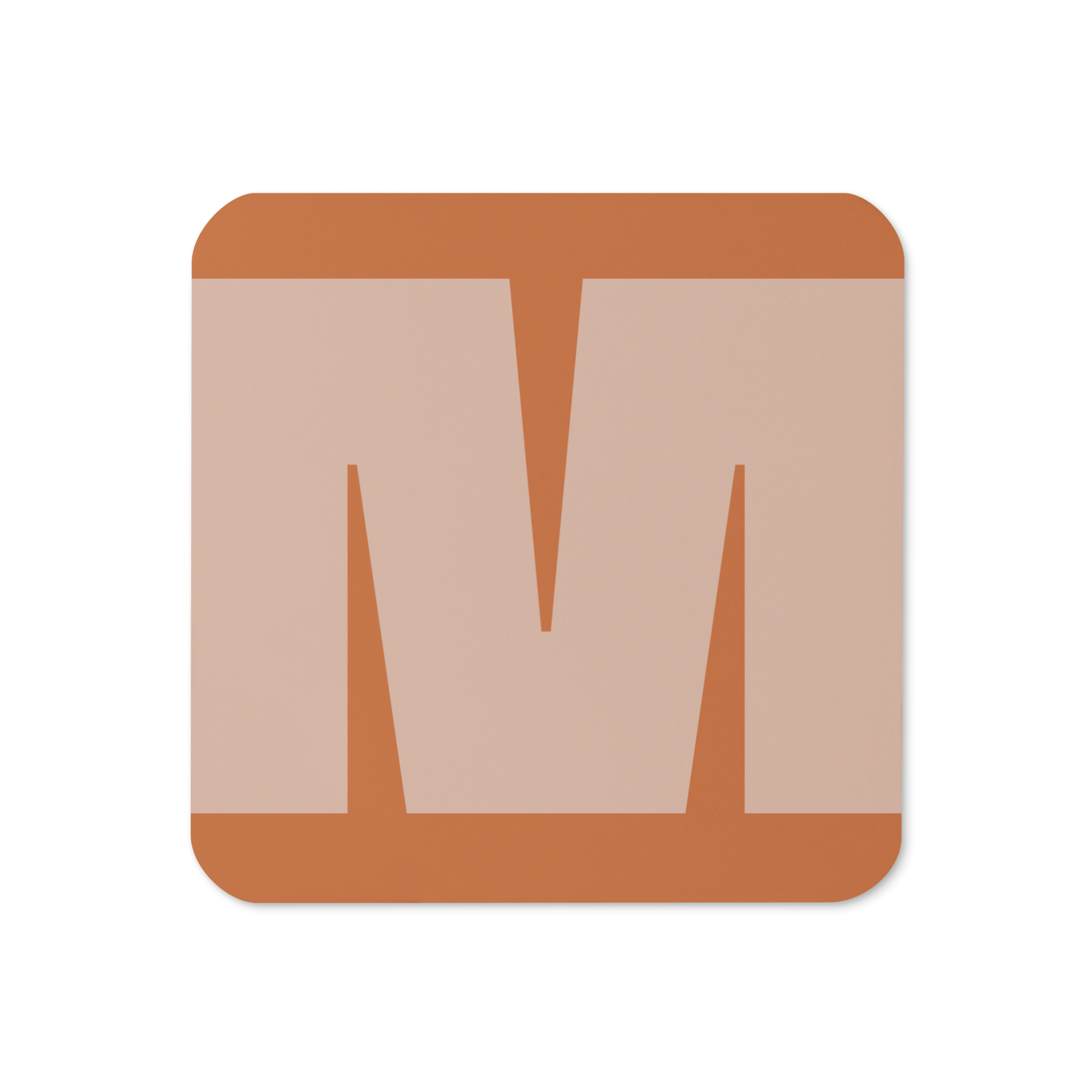 Cork-back coaster with a bold soft peach fat font M letter on an orange background, graphic modern design.