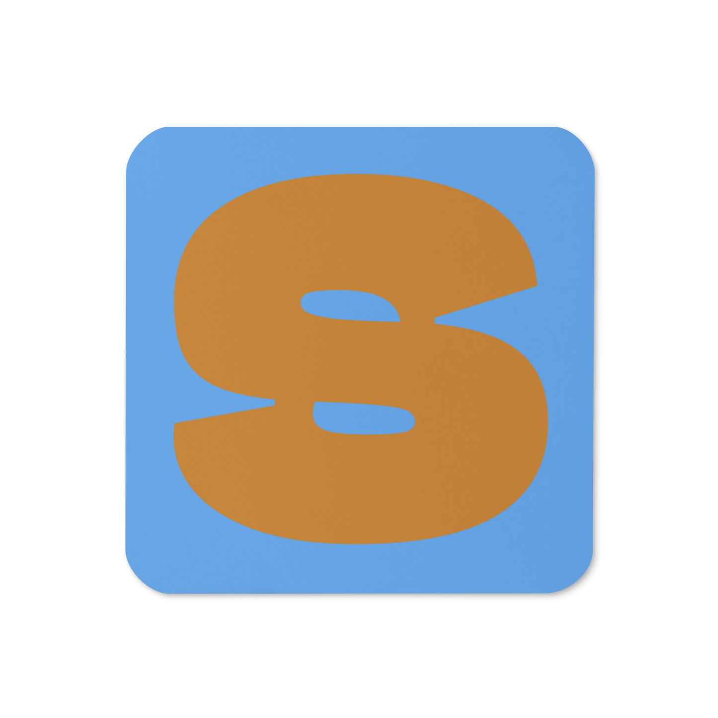 Cork-back coaster with a bold ochre fat font S letter on a sky blue background, graphic modern design.