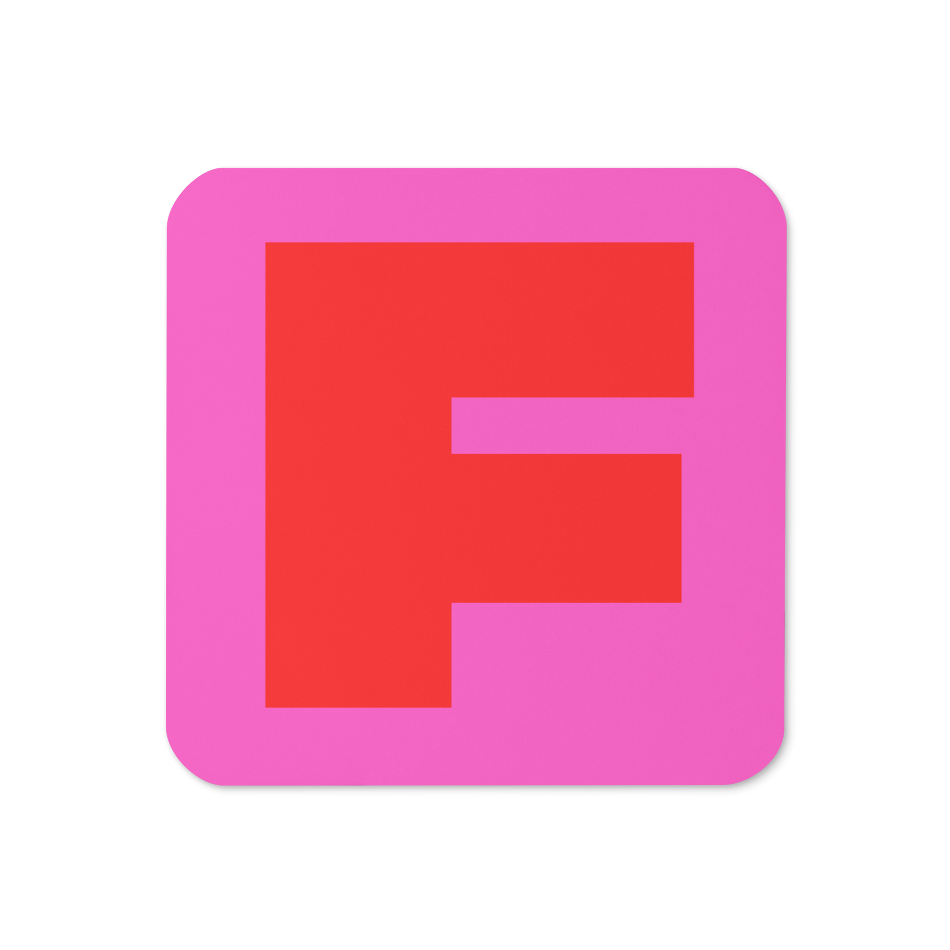 Cork-back coaster with a bold red fat font F letter on a hot pink background, graphic modern design.